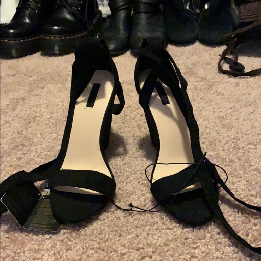 New worn black lace up wedges